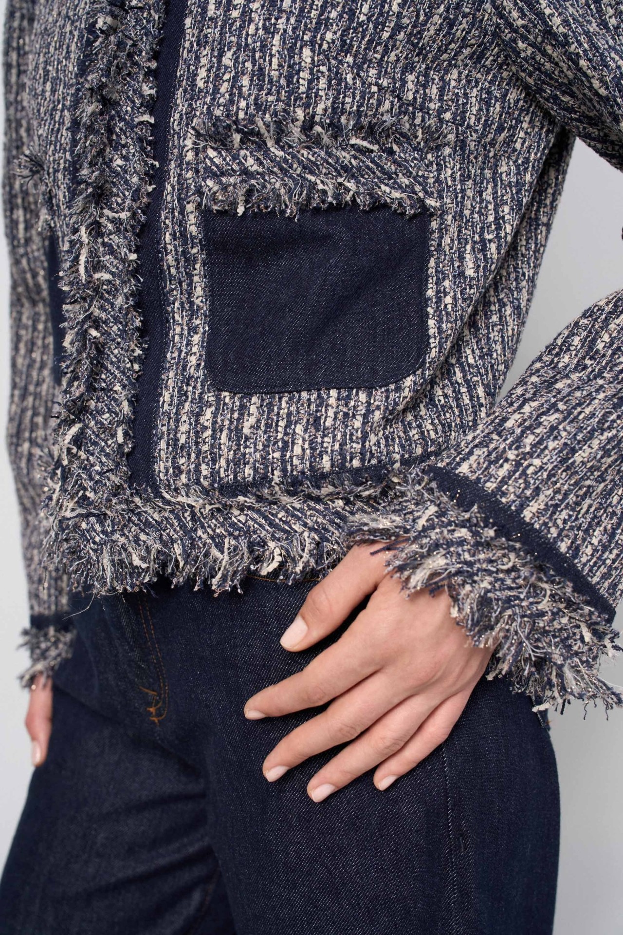 CHAQUETA DE TWEED CON FLECOS
