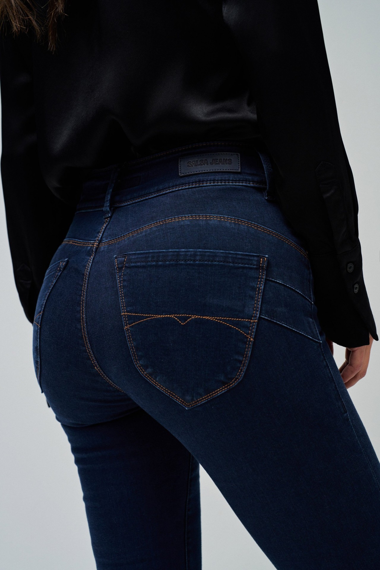 JEANS SECRET PUSH IN BOOTCUT SOFT TOUCH