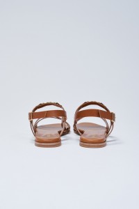 SANDALEN MET EEN PLATTE ZOOL VAN LEER