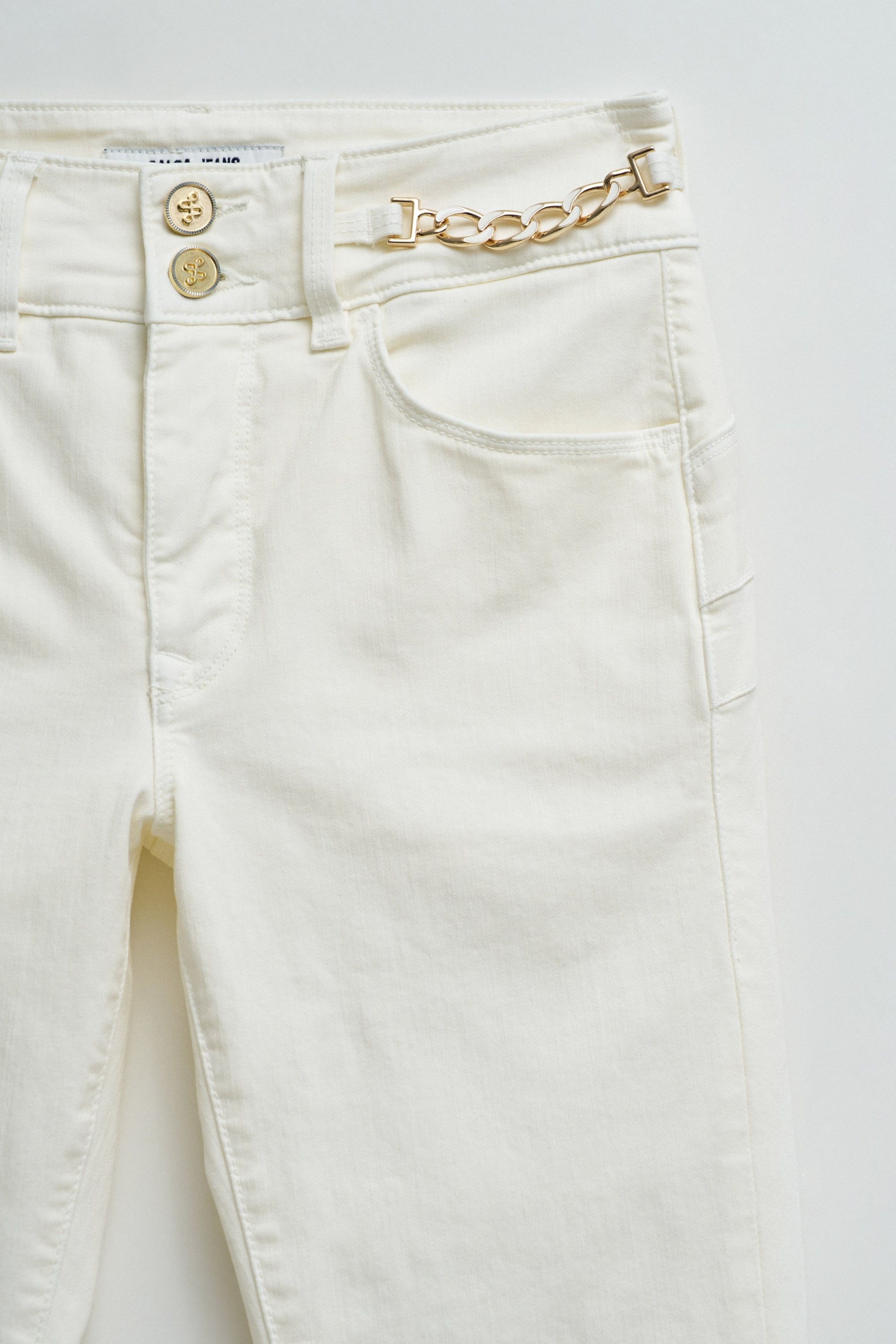 SECRET PUSH IN CROPPED SKINNY JEANS
