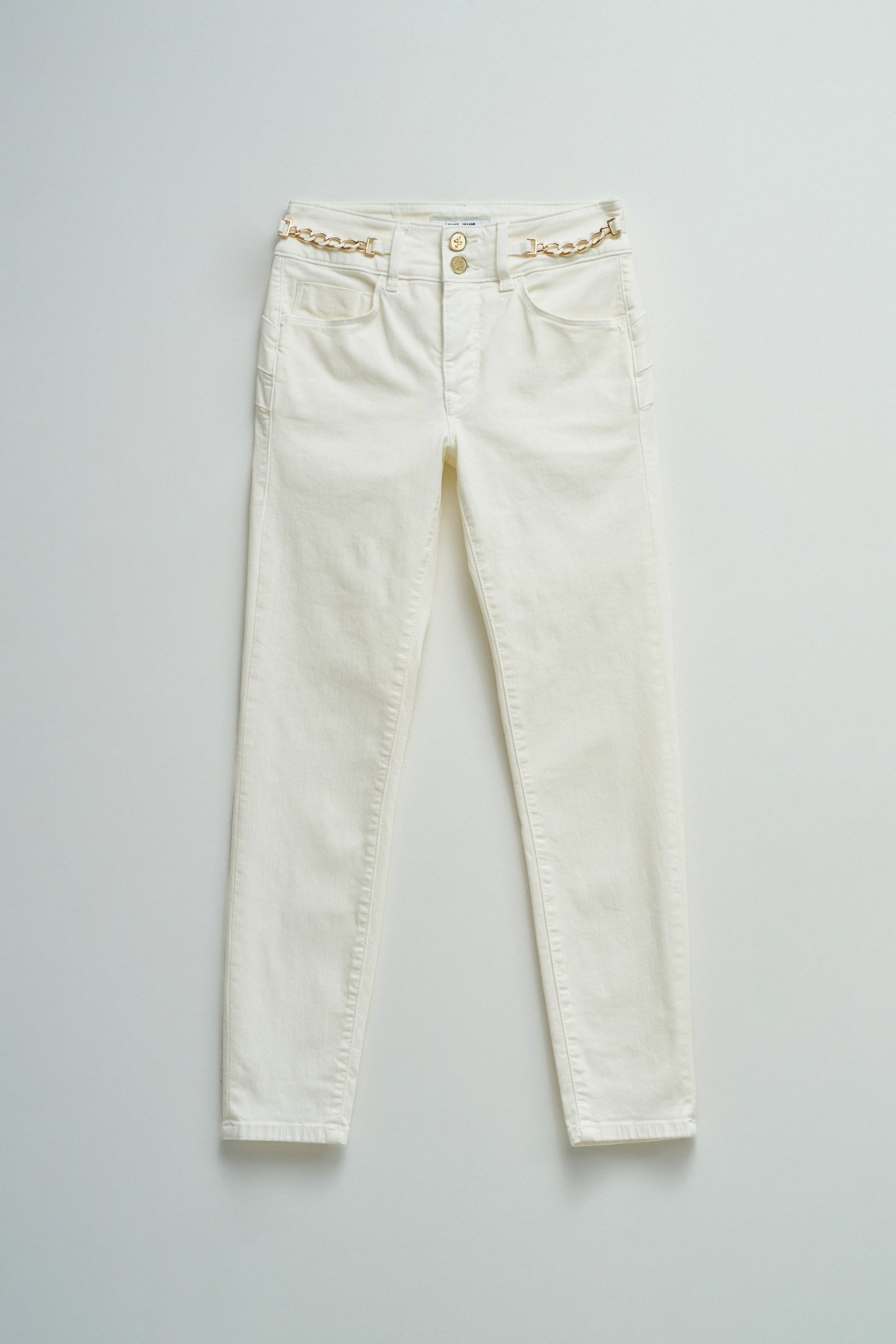 SECRET PUSH IN CROPPED SKINNY JEANS