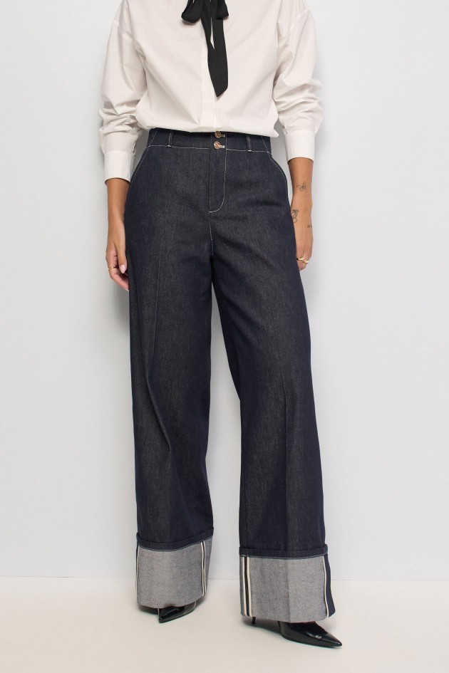 VAQUEROS CON PERNERA WIDE DENIM ATELIER