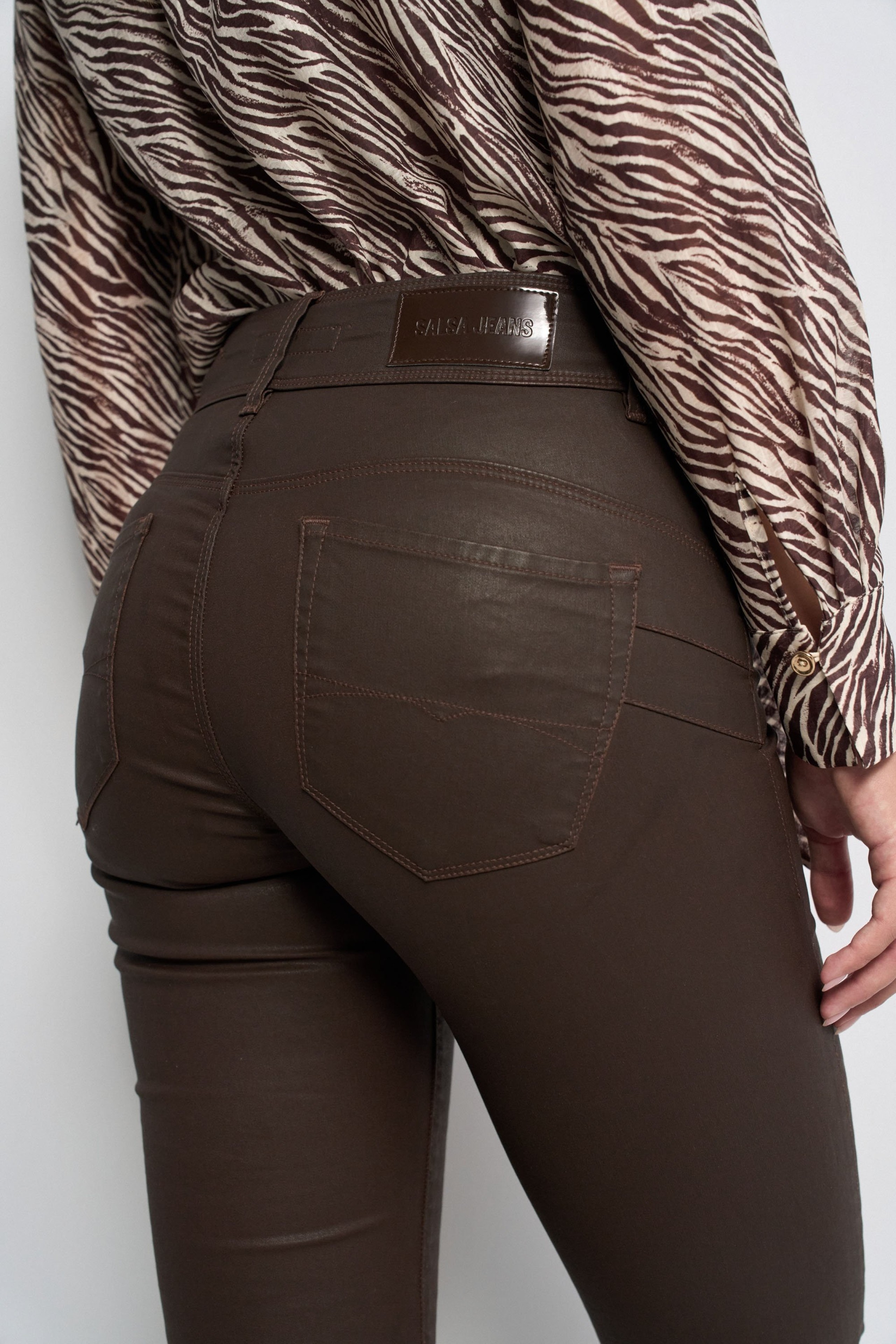 SECRET PUSH IN BOOTCUT COATED JEANS