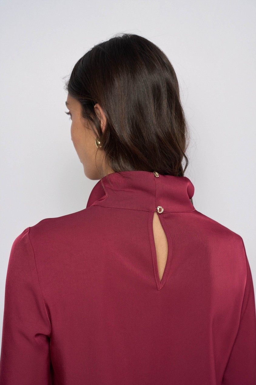 BLUSE MIT METALLDETAIL